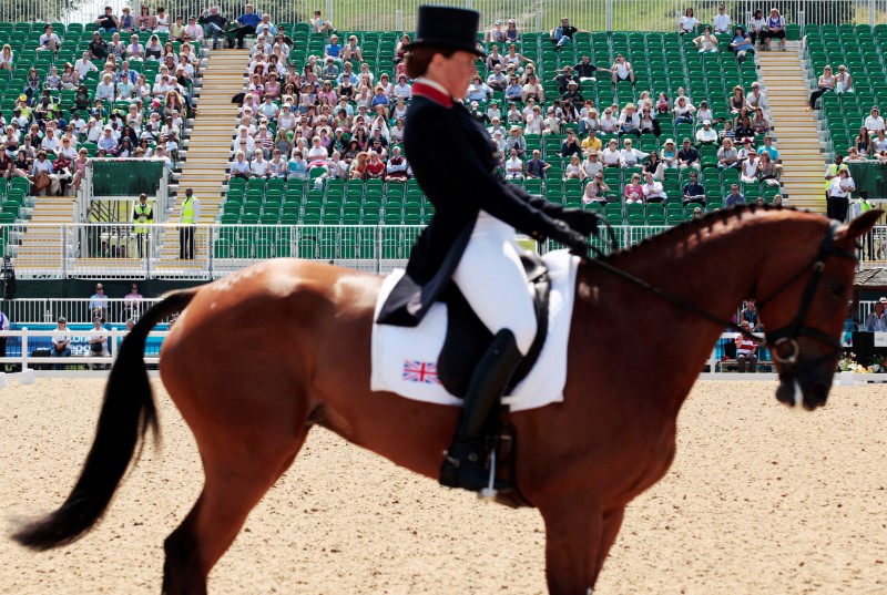 © Reuters. Pippa Funnell represents Great Britain during the dressage round of the Equestrian Eventing at Greenwich Park, in south London