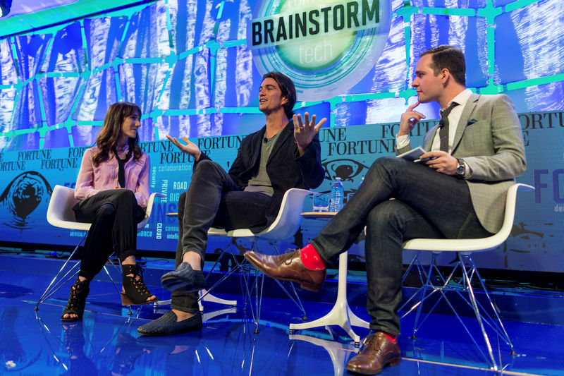 © Reuters. Adam Neumann CEO of WeWork and his wife Rebekah Newmann, chief brand officer for the company, are shown onstage as they are interviewed by Fortune's Andrew Nusca during the Fortune Brainstorm Tech conference in Aspen, Colorado