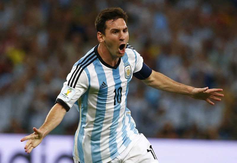 © Reuters. Argentina's Messi celebrates scoring a goal against Bosnia during their 2014 World Cup Group F soccer match at the Maracana stadium in Rio de Janeiro