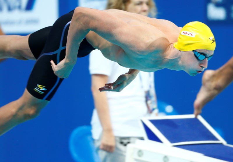 © Reuters. Australia's Mcevoy starts in men's 200m freestyle heat during Aquatics World Championships in Kazan