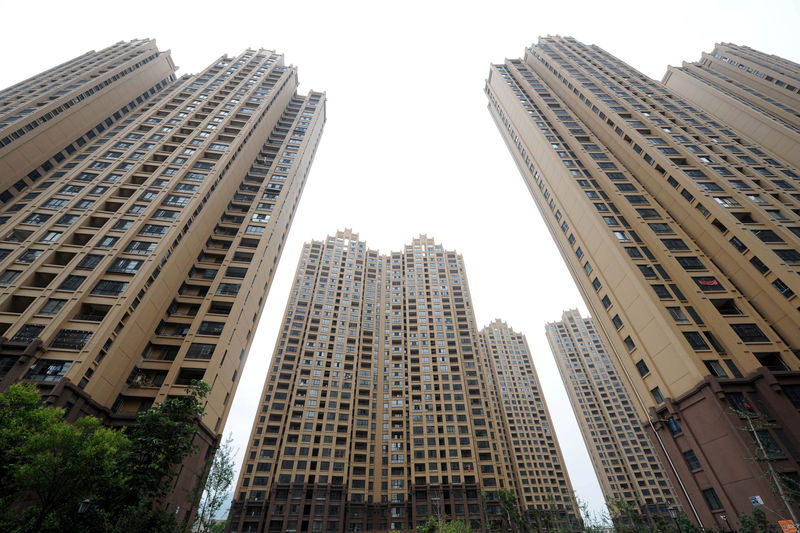 © Reuters. Residential buildings are seen in Huaibei