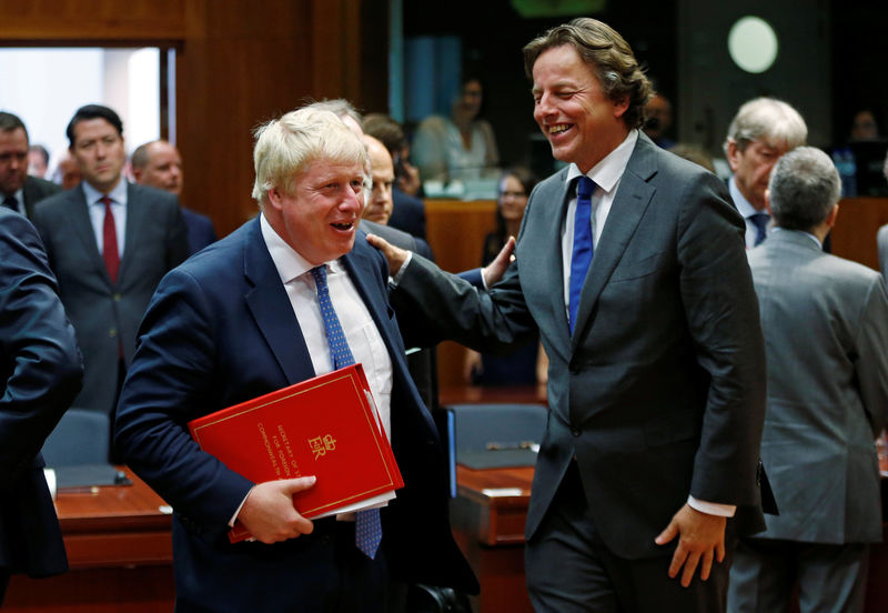 © Reuters. Britain's Foreign Secretary Johnson and Dutch FM Koenders attend a European Union foreign ministers meeting in Brussels