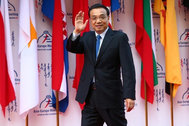 © Reuters. Leaders arrive the opening session of the Asia-Europe Meeting (ASEM) summit in Ulaanbaatar