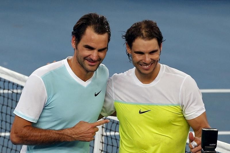 © Reuters. Federer y Nadal se retiran de Copa Rogers pensando en los Juegos Olímpicos