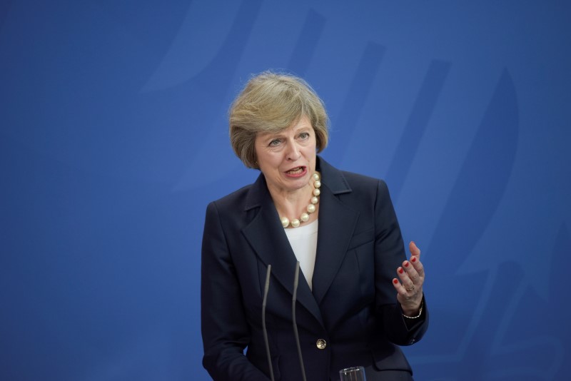 © Reuters. British Prime Minister May addresses news conference in Berlin