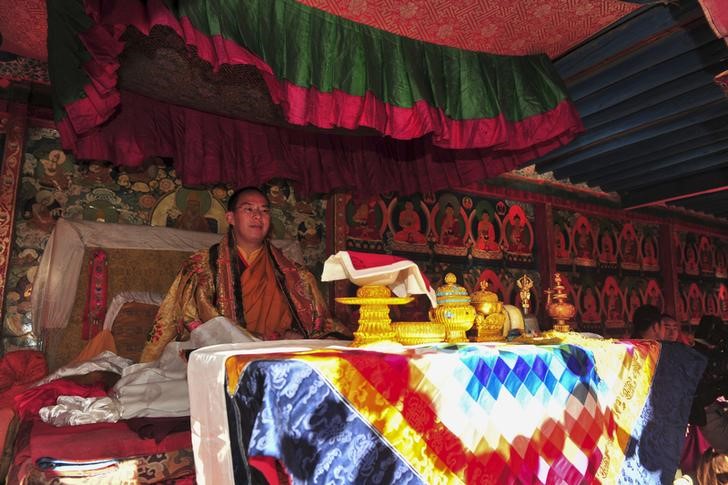 © Reuters. Gyaltsen Norbu, the 11th Panchen Lama, attends a Buddhism gathering at the Tashilhunpo Monastery in Shigatse