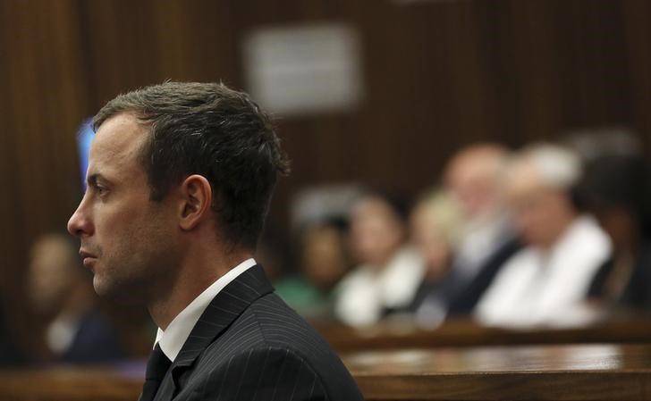 © Reuters. South African Olympic and Paralympic sprinter Pistorius sits in the dock before the defence's final argument in the North Gauteng High Court in Pretoria
