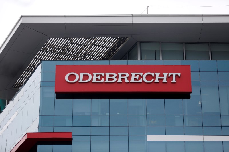 © Reuters. A sign of the Odebrecht SA construction conglomerate is pictured in Lima