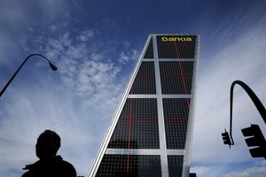 © Reuters. Presión por bajos tipos de interés lastra las cuentas de Bankia a junio
