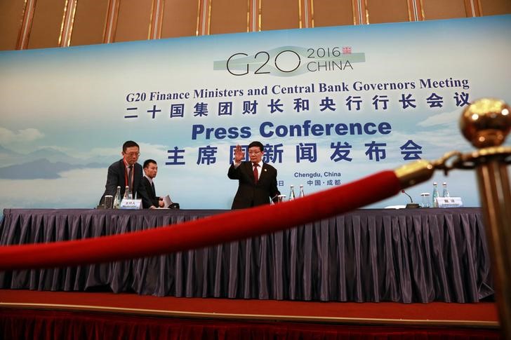 © Reuters. China's Minister of Finance Lou Jiwei arrives for a press conference held at the close of the G20 Finance Ministers and Central Bank Governors meeting in Chengdu in Southwestern China's Sichuan province