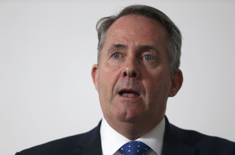 © Reuters. Liam Fox speaks at a news conference in central London