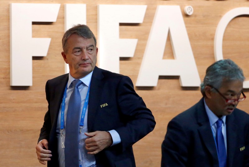 © Reuters. FIFA executive committee member Niersbach walks out of the stage during the Extraordinary Congress in Zurich