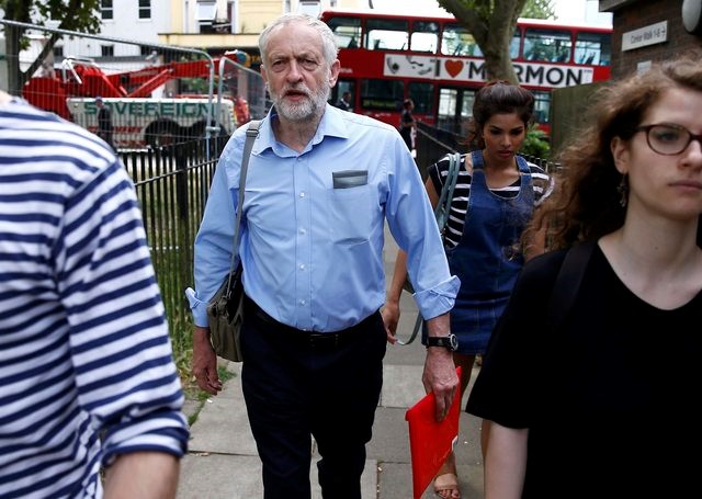 © Reuters. Britain's opposition Labour Party leader Jeremy Corbyn walks near his home in London