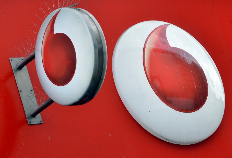 © Reuters. Vodafone branding is seen outside a retail store in London