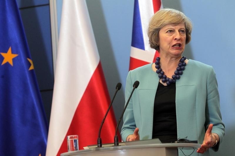 © Reuters. Britain's Prime Minister Theresa May attends a news conference at the Prime Minister's Chancellery in Warsaw