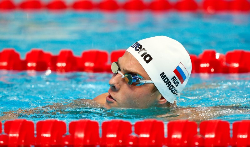 © Reuters. Russia's Morozov reacts during the men's 100m freestyle semi-final at the Aquatics World Championships in Kazan