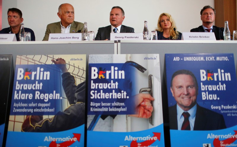 © Reuters. Padzerski, top candidate of the anti-immigration party AfD for the Berlin state elections, attends a news conference in Berlin