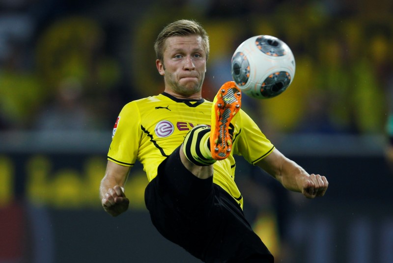 © Reuters. Borussia Dortmund's Jakub Blaszczykowski kicks a ball during the German first division Bundesliga soccer match against Werder Bremen in Dortmund