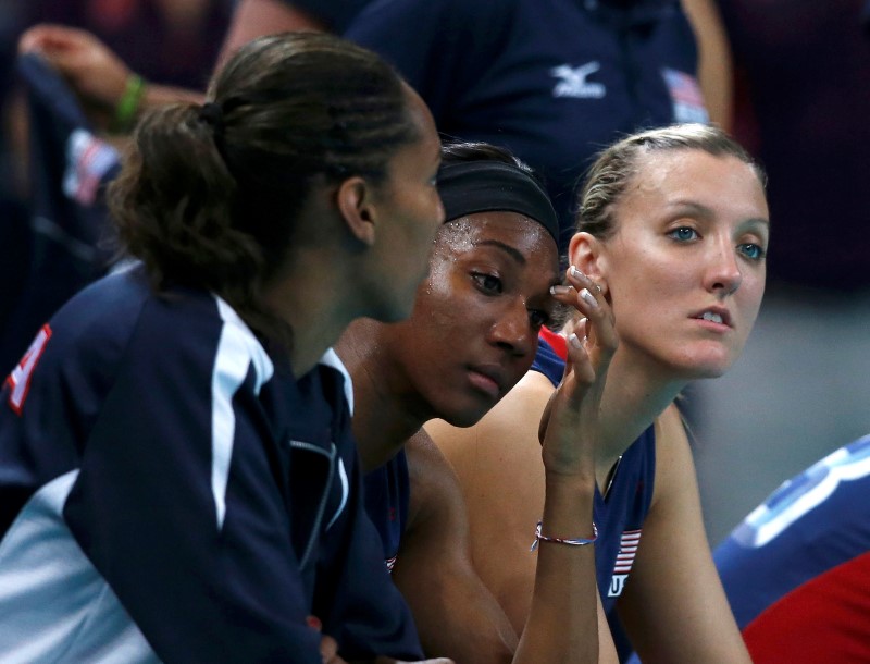 © Reuters. File photo of U.S. players reacting after losing their women's gold medal volleyball match against Brazil in London