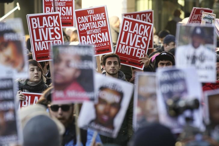 © Reuters. Black Lives Matter protesters gather in Westlake Park near Westlake Mall during Black Friday in Seattle