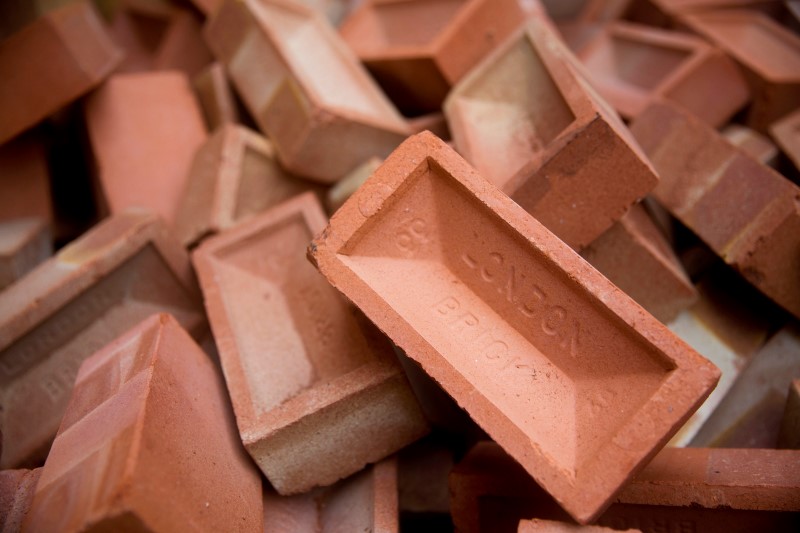 © Reuters. Bricks are seen at the Vauxhall depot of building material supplier Travis Perkins in London