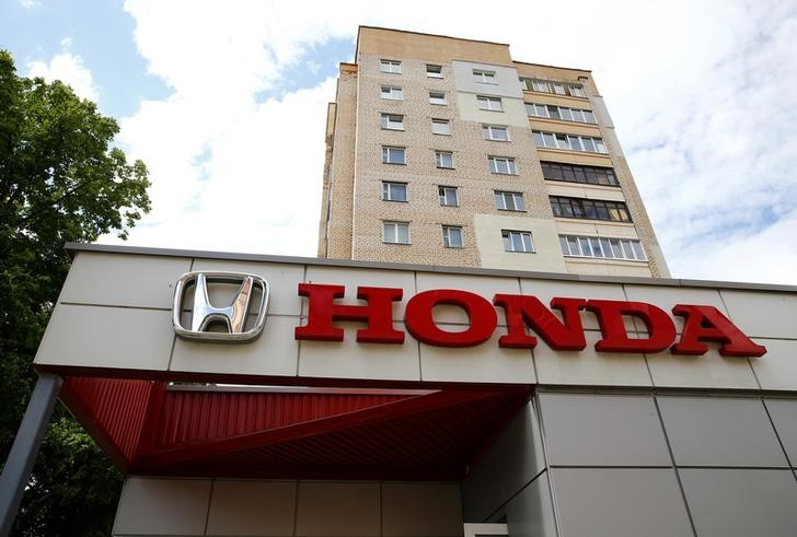 © Reuters. Honda car company logo is seen on a building in Minsk