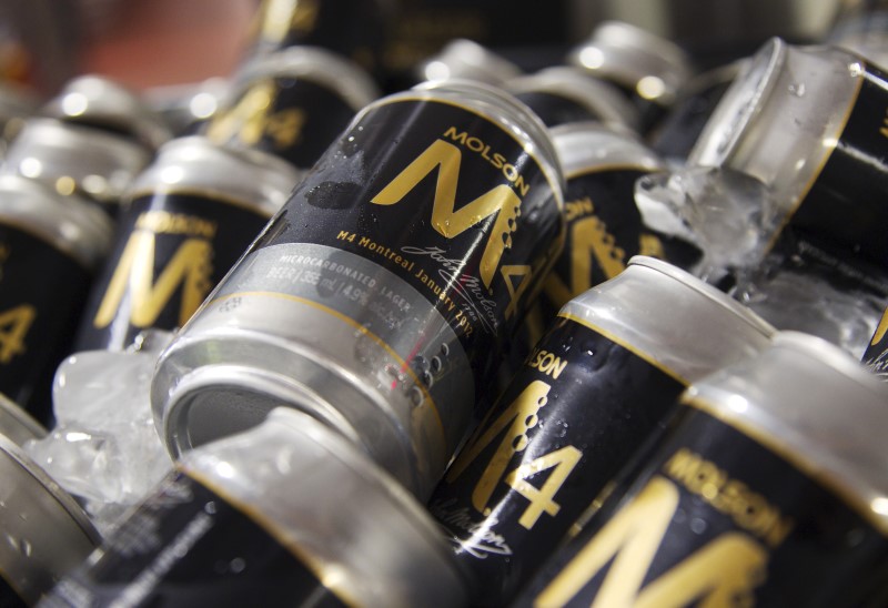 © Reuters. Cans of Molson beer are seen at a news conference in Montreal