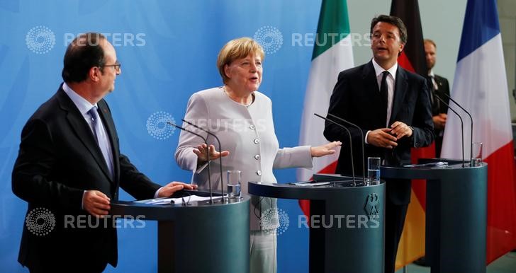 © Reuters. Merkel, Hollande e Renzi