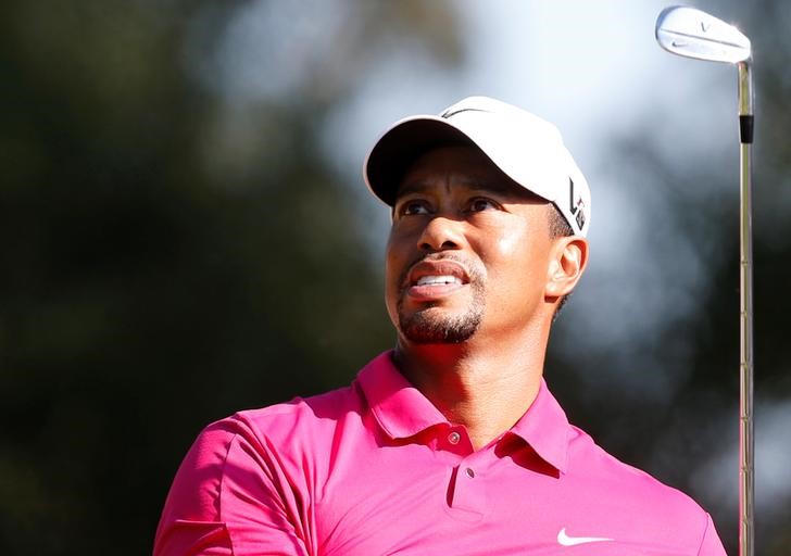 © Reuters. Tiger Woods of the U.S. tees off on the eighth hole during the third round of the inaugural Turkish Airlines Open in the southwest city of Antalya