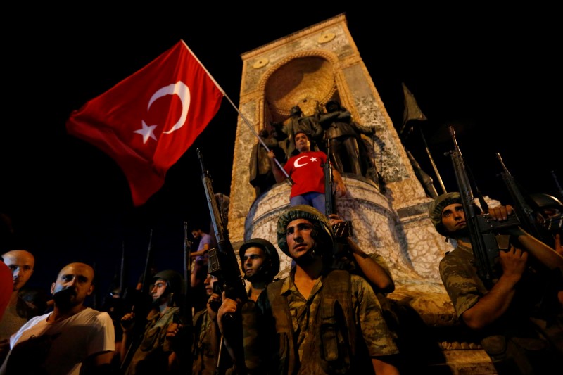 © Reuters. Turkish military stand guard near Taksim Square in Istanbul