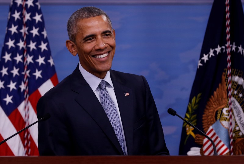 © Reuters. Obama smiles during a news conference at the Pentagon in Arlington, Virginia, U.S.