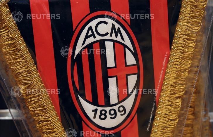 © Reuters. The AC Milan logo is pictured on a pennant in a soccer store in downtown Milan