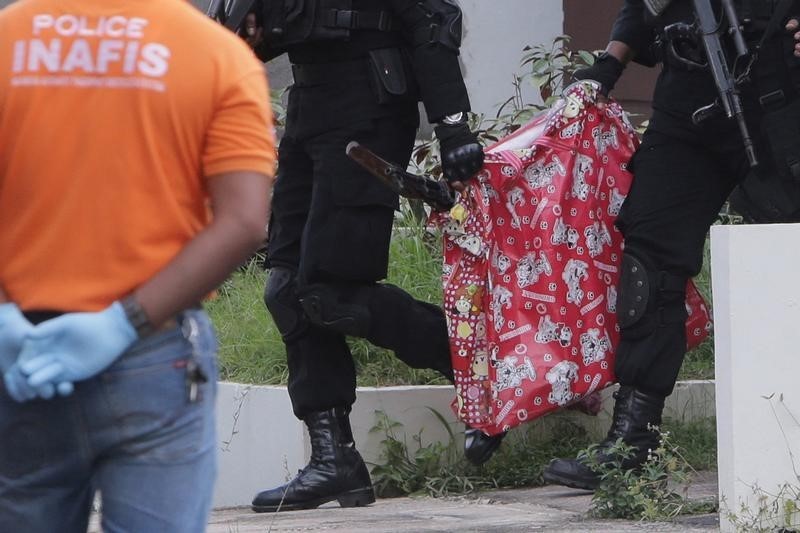 © Reuters. Singapur pide extremar vigilancia tras frustrar un ataque con cohetes