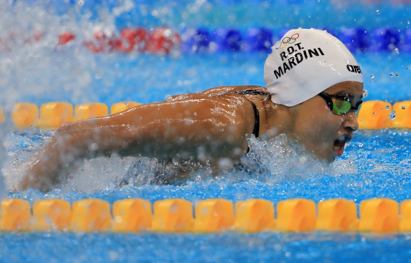 © Reuters. Swimming - Women's 100m Butterfly - Heats