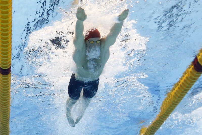 © Reuters. Swimming - Men's 100m Breaststroke Semifinals