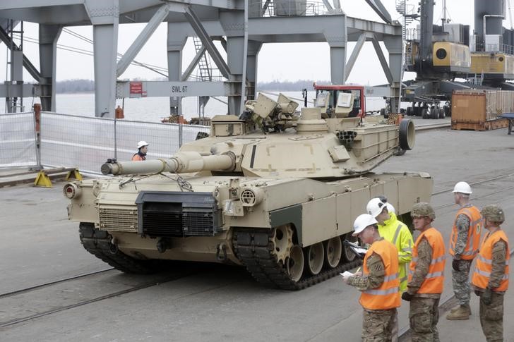 © Reuters. An Abrams MBT leaves Riga port