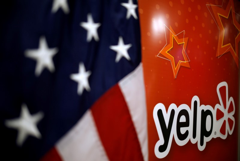 © Reuters. The Yelp Inc. logo is seen in their offices in Chicago, Illinois