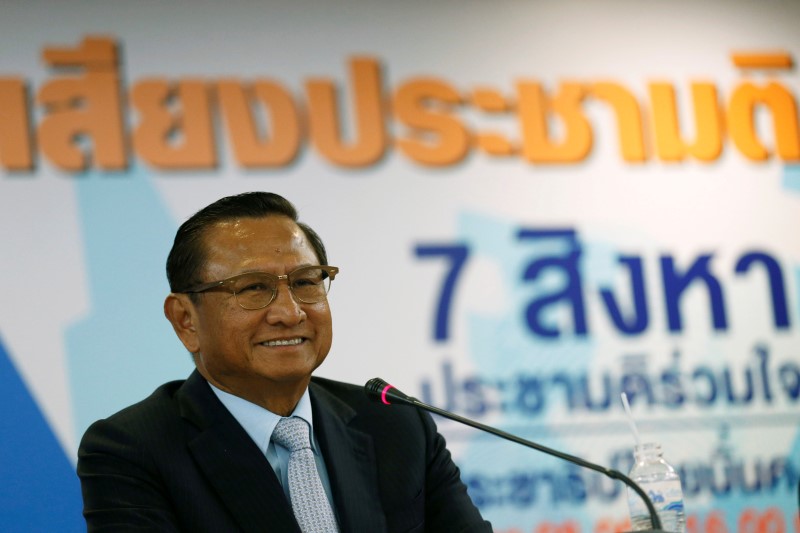 © Reuters. Somcharoen smiles during a news conference in Bangkok