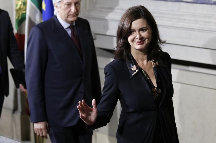 © Reuters. Italy's lower house President  Boldrini smiles at the end of the first day of consultations with Italian President Giorgio Napolitano at the Quirinale Palace in Rome