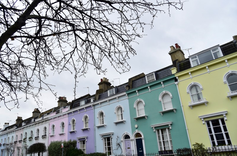 © Reuters. File photo of painted property fronts in a residential street in London