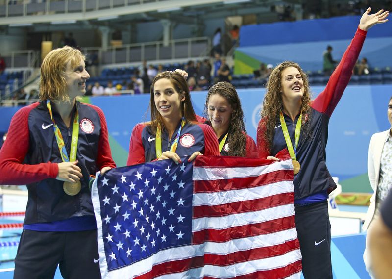 © Reuters. Swimming - Women's 4 x 200m Freestyle Relay Victory Ceremony