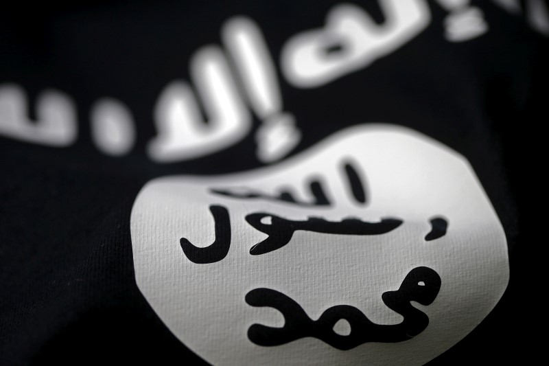 © Reuters. A picture illustration of an Islamic State flag