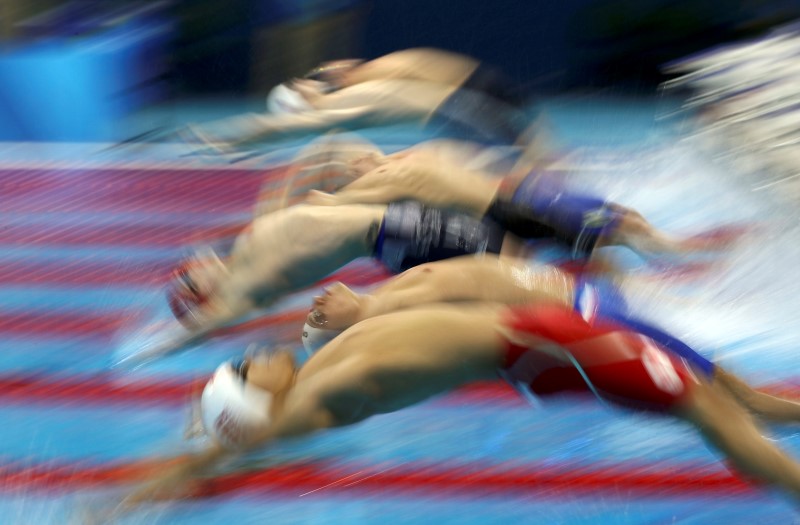 © Reuters. Swimming - Men's 4 x 100m Medley Relay - Heats