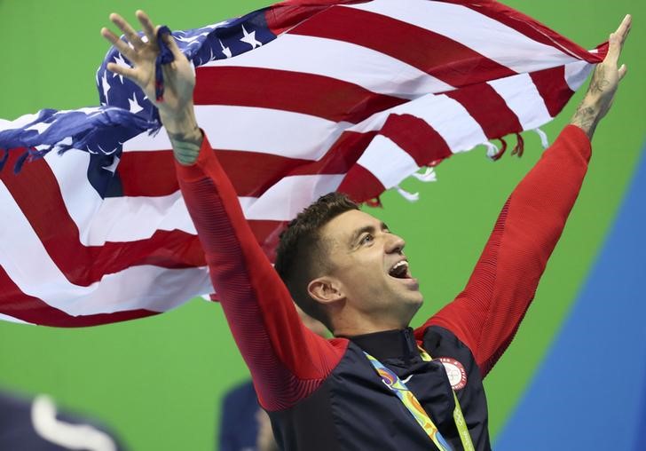 © Reuters. Swimming - Men's 50m Freestyle Victory Ceremony