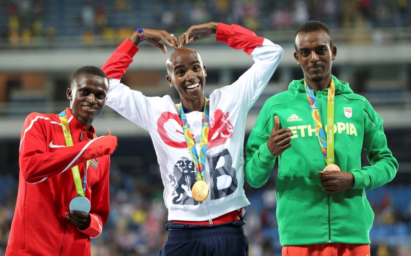 © Reuters. Athletics - Men's 10,000m Victory Ceremony