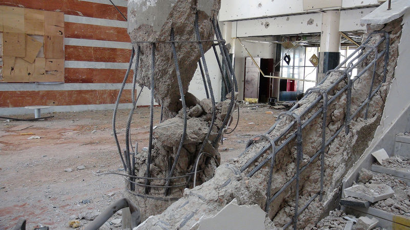 © Reuters. The damage is seen in Ouagadougou Conference Centre after it was captured by Libyan forces battling to oust Islamic State, in Sirte