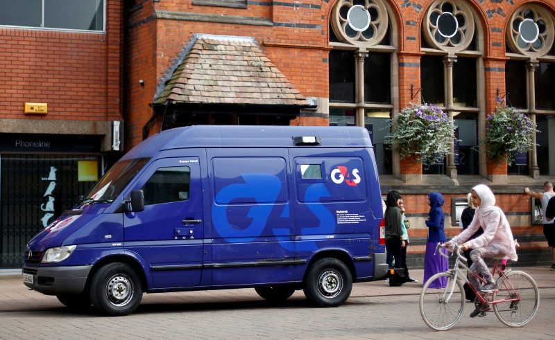 © Reuters. File photo of a G4S security van parked outside a bank in Loughborough