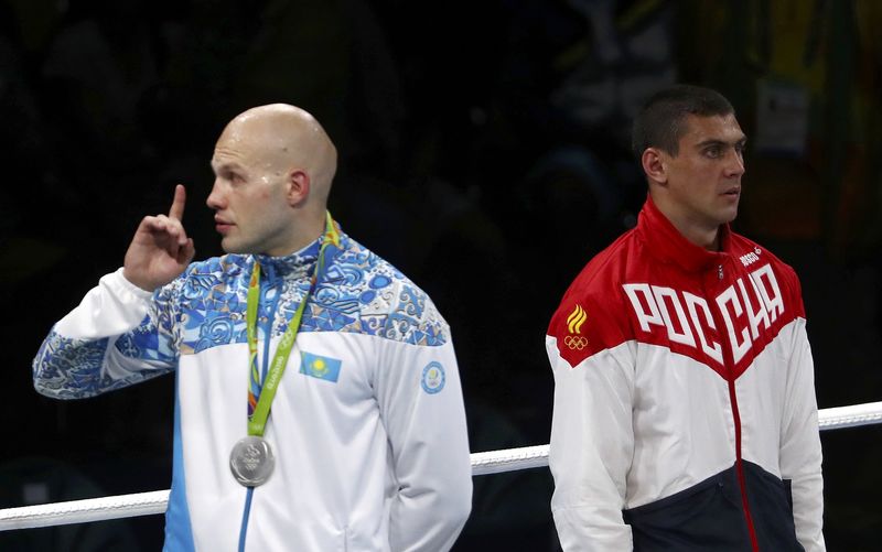 © Reuters. الروسي تيتشينكو ينال ذهبية الوزن الثقيل في الملاكمة وسط صيحات استهجان