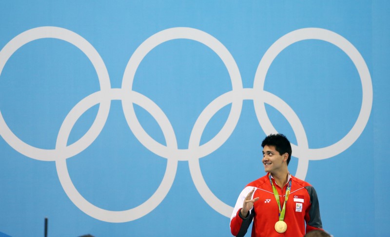 © Reuters. Swimming - Men's 100m Butterfly Victory Ceremony