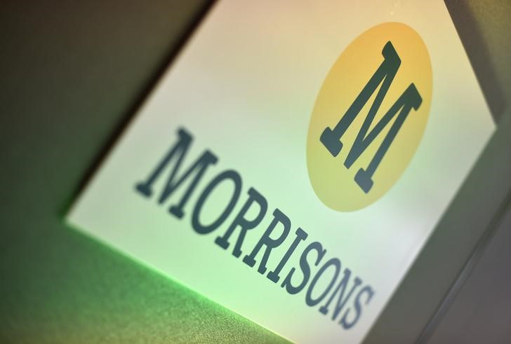 © Reuters. Branding for Morrisons is seen in a conference room in central London